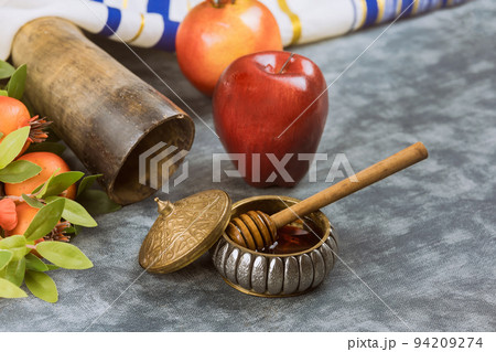 There are a number of traditional Jewish New Year symbols associated with Rosh Hashanah, such as apples, honey, and pomegranates There are a number of traditional Jewish New Year symbols associated with Rosh Hashanah, such as apples, honey, and pomegranates 94209274