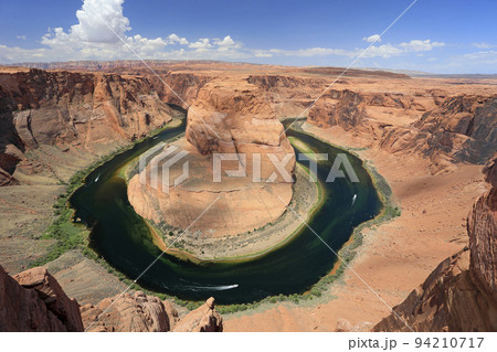 Horseshoe Bend on the Colorado River near Page Arizona on sunny late morning 94210717