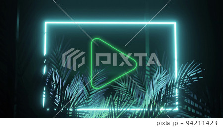 Image of play icon over neon shape and leaves on black background Image of play icon over neon shape and leaves on black background 94211423