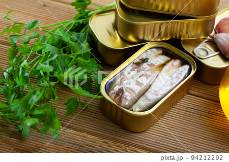 Tasty canned mackerel fish in sunflower oil with greens 94212292