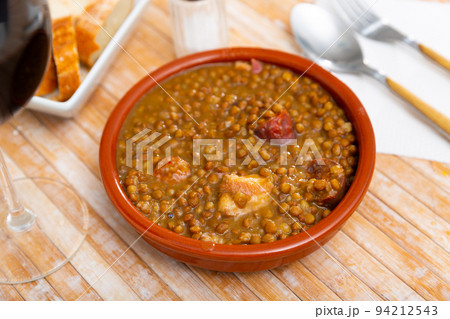 Stewed lentils with sausages, spanish Riojan lentils Stewed lentils with sausages, spanish Riojan lentils 94212543