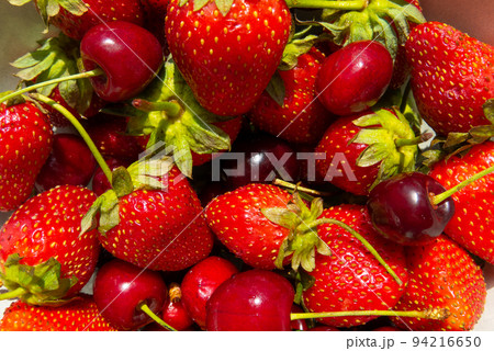 Ripe tasty berries apricot, sweet cherry, strawberry close up. Top view 94216650