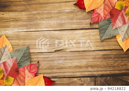 Autumn leaves on wood Autumn leaves on wood 94218822