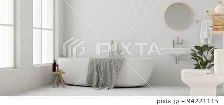 Modern elegance white bathroom interior design with bathtub, toilet, towel, washbasin and decor 94221115