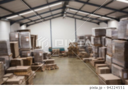 Defocused image of cardboard boxes 94224551