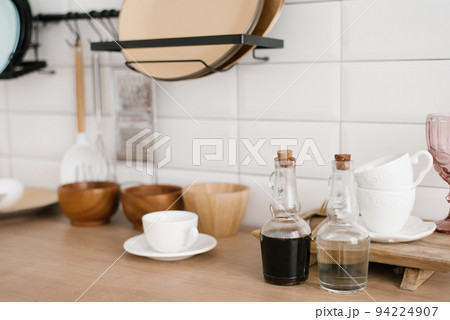 Sauces in glass bottles are among the kitchen utensils Sauces in glass bottles are among the kitchen utensils 94224907