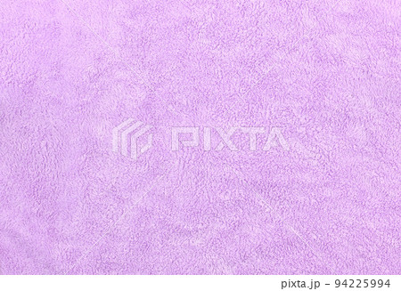 Flat lay of purple fluffy towel fabric texture. Blank and soft bathroom carpet surface. Flat lay of purple fluffy towel fabric texture. Blank and soft bathroom carpet surface. 94225994