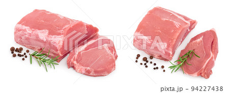 Raw pork meat with rosemary and peppercorn isolated on white background 94227438