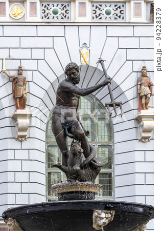 Neptune fountain in Gdansk, Pomerania, Poland. Sculpture in Old Town. Gdansk historical city landmark. 94228379