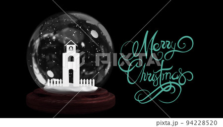 Image of merry christmas text over snow globe Image of merry christmas text over snow globe 94228520