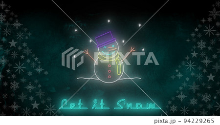 Image of let it snow text at christmas over snowman and winter scenery 94229265