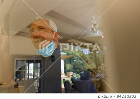 Senior caucasian man spending time at home Senior caucasian man spending time at home 94230202