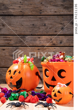 Close up view of pumpkin shaped bucket full of...の写真素材