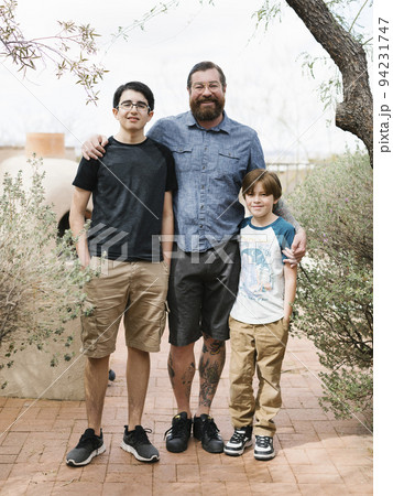 Portrait of father with two sons (8-9, 14-15) Portrait of father with two sons (8-9, 14-15) 94231747