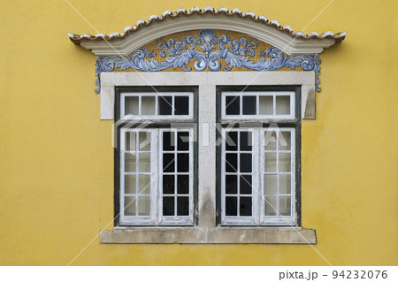Portugal, Santarem, Yellow building with traditional tile work Portugal, Santarem, Yellow building with traditional tile work 94232076