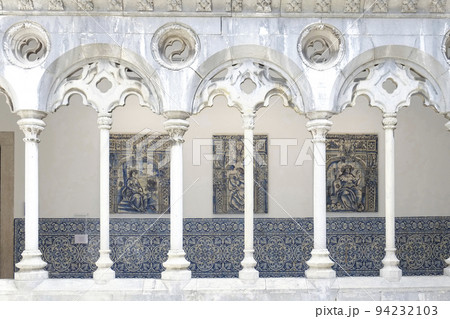 Portugal, Lisbon, Colonnade and archway with azulejos 94232103