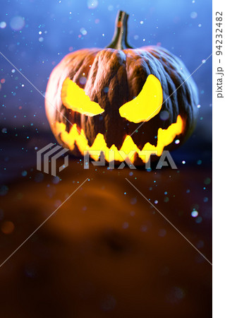 Scary Halloween Pumpkin looking through the smoke. Scary Halloween Pumpkin looking through the smoke. 94232482