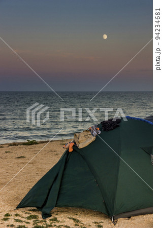 green tent at the evening sea beach green tent at the evening sea beach 94234681