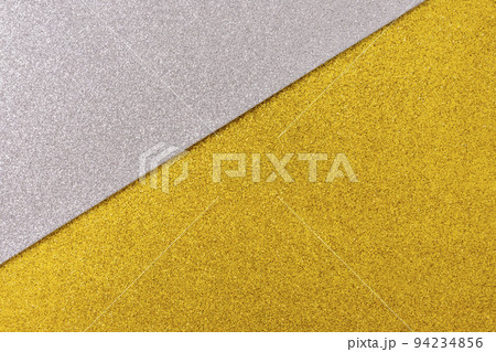 Shiny and glittering surface. Silver and gold, abstract background. Events, celebrations. Trendy backdrop for your design. Texture with glitter. Shiny and glittering surface. Silver and gold, abstract background. Events, celebrations. Trendy backdrop for your design. Texture with glitter. 94234856