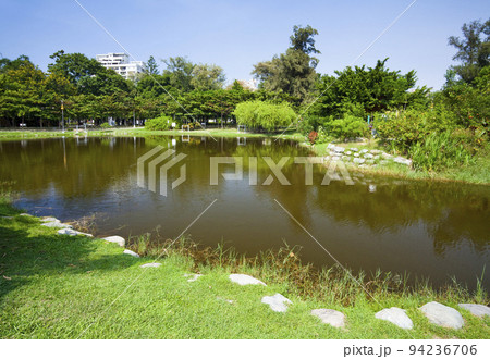 beautiful view of Central Park in Kaohsiung, Taiwan, It is one of the famous attractions in Kaohsiung. View of the artificial lake in Kaohsiung Central Park, Taiwan beautiful view of Central Park in Kaohsiung, Taiwan, It is one of the famous attractions in Kaohsiung. View of the artificial lake in Kaohsiung Central Park, Taiwan 94236706