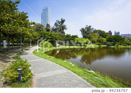 beautiful view of Central Park in Kaohsiung, Taiwan, It is one of the famous attractions in Kaohsiung. View of the artificial lake in Kaohsiung Central Park, Taiwan beautiful view of Central Park in Kaohsiung, Taiwan, It is one of the famous attractions in Kaohsiung. View of the artificial lake in Kaohsiung Central Park, Taiwan 94236707