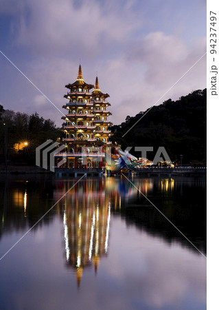 Architecture view of the Dragon and Tiger Pagodas in Lotus Pond of Kaohsiung, Taiwan. it is a temple located at Lotus Pond in Zuoying District, Kaohsiung, Taiwan. Architecture view of the Dragon and Tiger Pagodas in Lotus Pond of Kaohsiung, Taiwan. it is a temple located at Lotus Pond in Zuoying District, Kaohsiung, Taiwan. 94237497