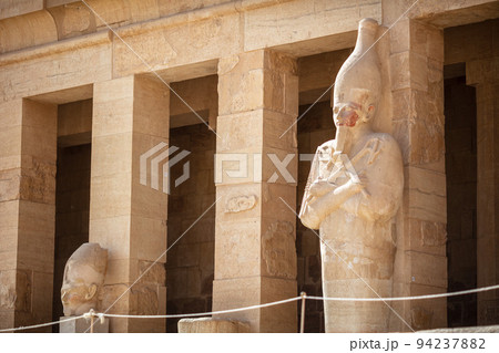 View of Hatshepsut's temple. Mortuary temple of the pharaoh of the Hatshepsut dynasty. Jeser-Jeseru is a masterpiece of ancient Egyptian architecture. The sanctuary is carved right into the rocks. 94237882