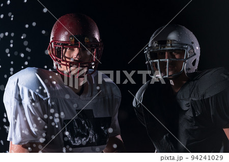 two american football players face to face in silhouette shadow on white background 94241029