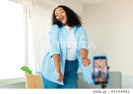 Black Female Blogger Making Video On Smartphone Dancing At Home Black Female Blogger Making Video On Smartphone Dancing At Home 94244681
