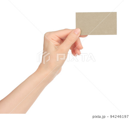 Hand holds blank business card on white background Hand holds blank business card on white background 94246197