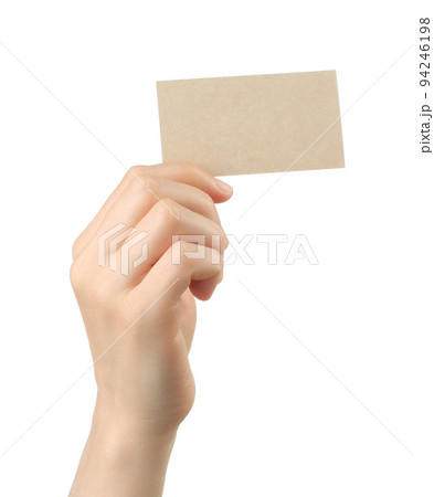 Hand holds blank business card on white background Hand holds blank business card on white background 94246198