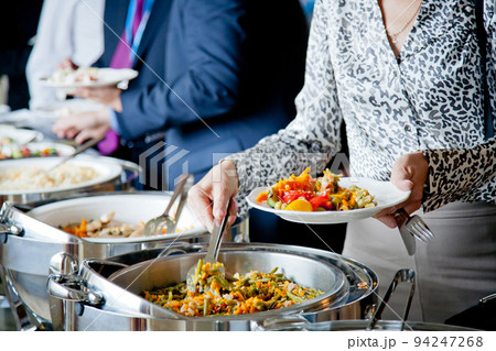 people at a banquet 94247268