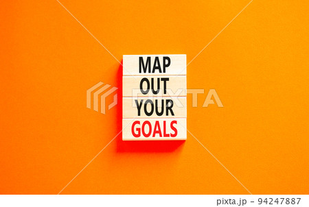 Support and map out your goals symbol. Concept words Map out your goals on wooden blocks on a beautiful orange table orange background. Business, support and map out your goals concept Support and map out your goals symbol. Concept words Map out your goals on wooden blocks on a beautiful orange table orange background. Business, support and map out your goals concept 94247887