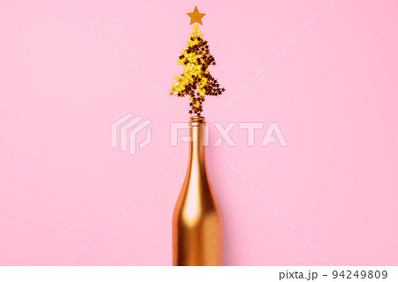 Champagne bottle with confetti flat lay top view Champagne bottle with confetti flat lay top view 94249809