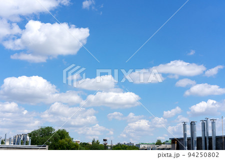 Clear blue sky background with white clouds Clear blue sky background with white clouds 94250802