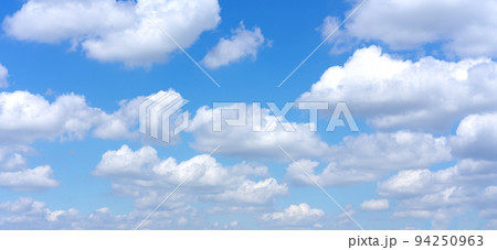 Clear blue sky background with white clouds Clear blue sky background with white clouds 94250963