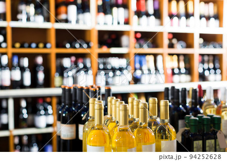 assortment of wine bottles. 94252628