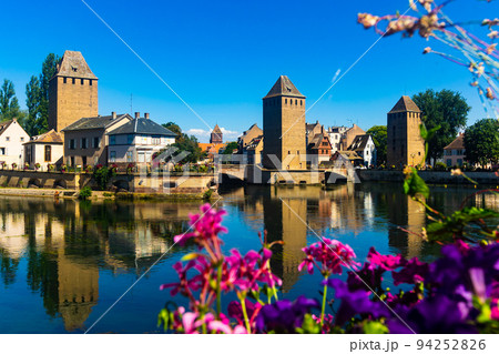 Strasbourg cityscape with Ponts Couverts and watchtowers seen from Barrage Vauban Strasbourg cityscape with Ponts Couverts and watchtowers seen from Barrage Vauban 94252826