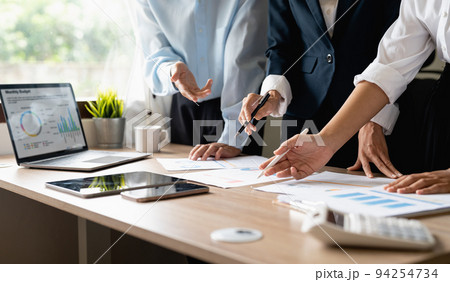 Team work process. Marketing strategy brainstorming. Paperwork and digital in modern office. 94254734