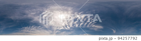 Blue sky panorama with Cirrus clouds. Seamless hdr 360 degree pano in spherical equirectangular format. Complete zenith for 3D visualization, game and sky replacement for aerial drone 360 panoramas. 94257792