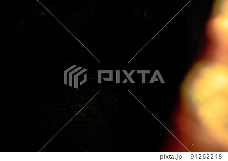 colorful warm rainbow light leaks on black background with dust texture colorful warm rainbow light leaks on black background with dust texture 94262248