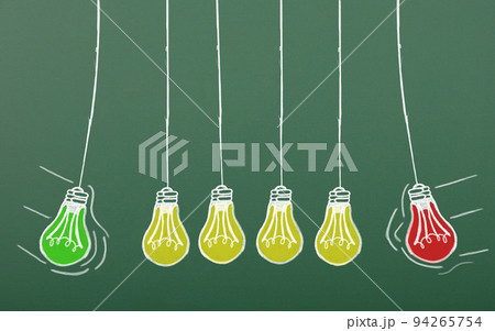 Blackboard with the drawn incandescent lamps Blackboard with the drawn incandescent lamps 94265754