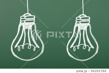 Blackboard with the drawn incandescent lamps Blackboard with the drawn incandescent lamps 94265760