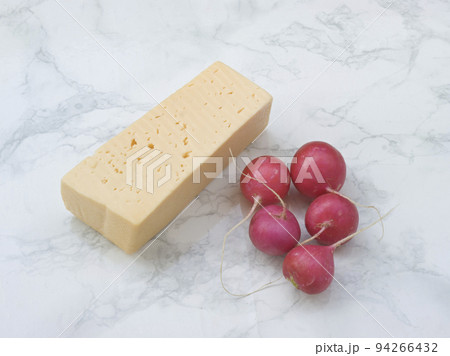 Lies on a table cheese and radishes Lies on a table cheese and radishes 94266432