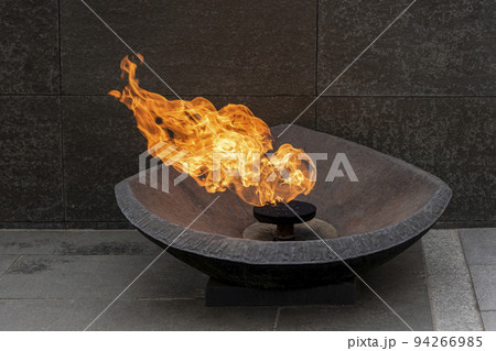 Burning eternal flame monument, memory of war symbol. 94266985