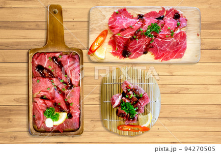 Top view of Big Set of striped calf beef prepare for grilled, focus selective 94270505