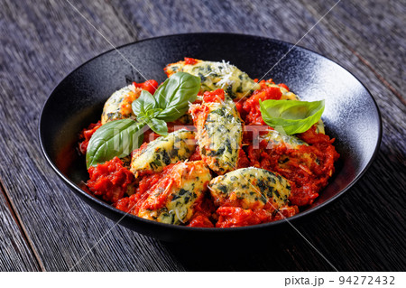 Malfatti, hot Italian spinach ricotta dumplings Malfatti, hot Italian spinach ricotta dumplings 94272432