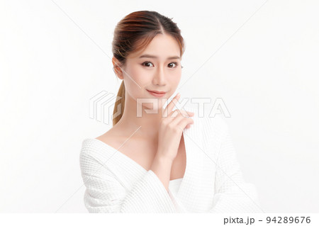 Beautiful young asian woman with clean fresh skin on white background, Face care, Facial treatment, Cosmetology, beauty and spa, Asian women portrait. 94289676