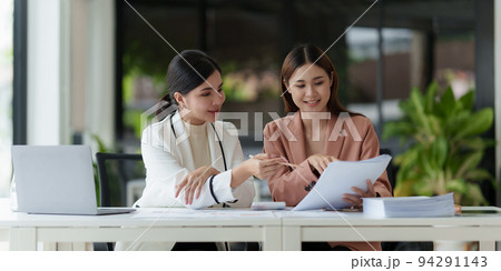 Asian Business Woman or Accountant do math and analyze with calculator and paperwork on desk, account, consult, audit and saving concept Asian Business Woman or Accountant do math and analyze with calculator and paperwork on desk, account, consult, audit and saving concept 94291143