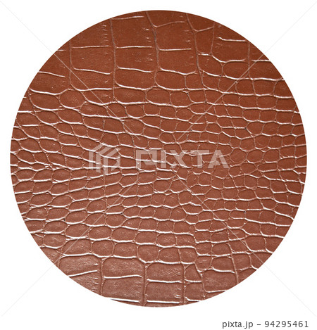 Very luxurious brown crocodile skin round texture used in textile industry 94295461